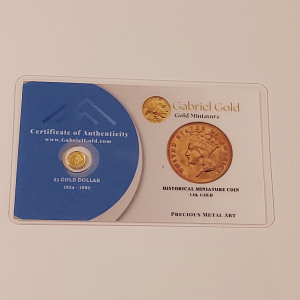 This product is a 14K Gold $3 Gold Dollar Miniature Coin.